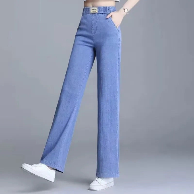 Kvinnors lösa jeans med elastisk midja och praktiska fickor Mirla-Eva Jonsson