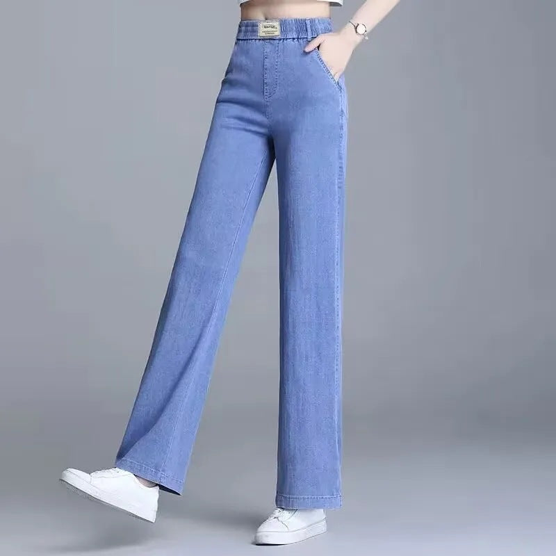 Kvinnors lösa jeans med elastisk midja och praktiska fickor Mirla-Eva Jonsson
