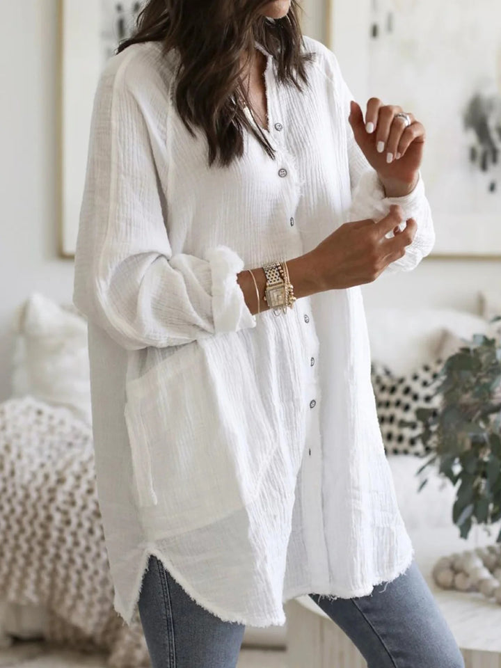 Kvinnors lösa långärmad blus med knappslå och bröstfickor Mirla-Eva Jonsson