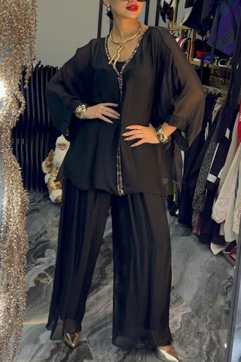 Kvinnors luftig jumpsuit med elegant överdrag och glittrande detaljer Mirla-Eva Jonsson