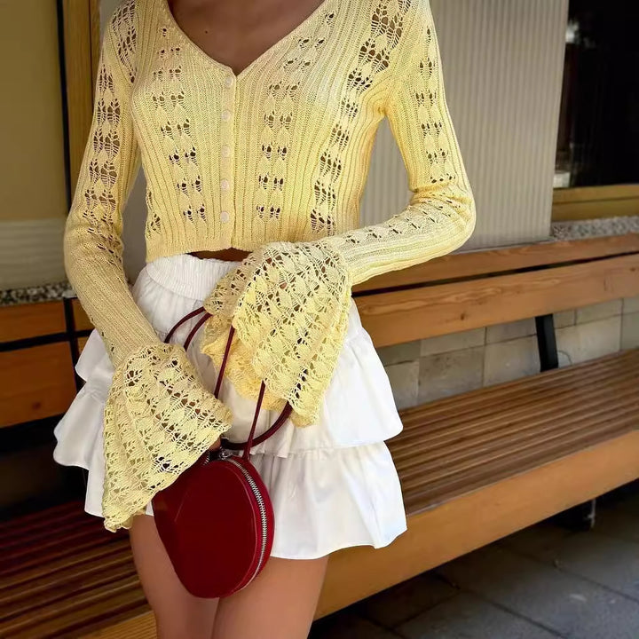 Kvinnors luftig stickad pullover i Boho-stil med voluminösa ärmar Mirla-Eva Jonsson