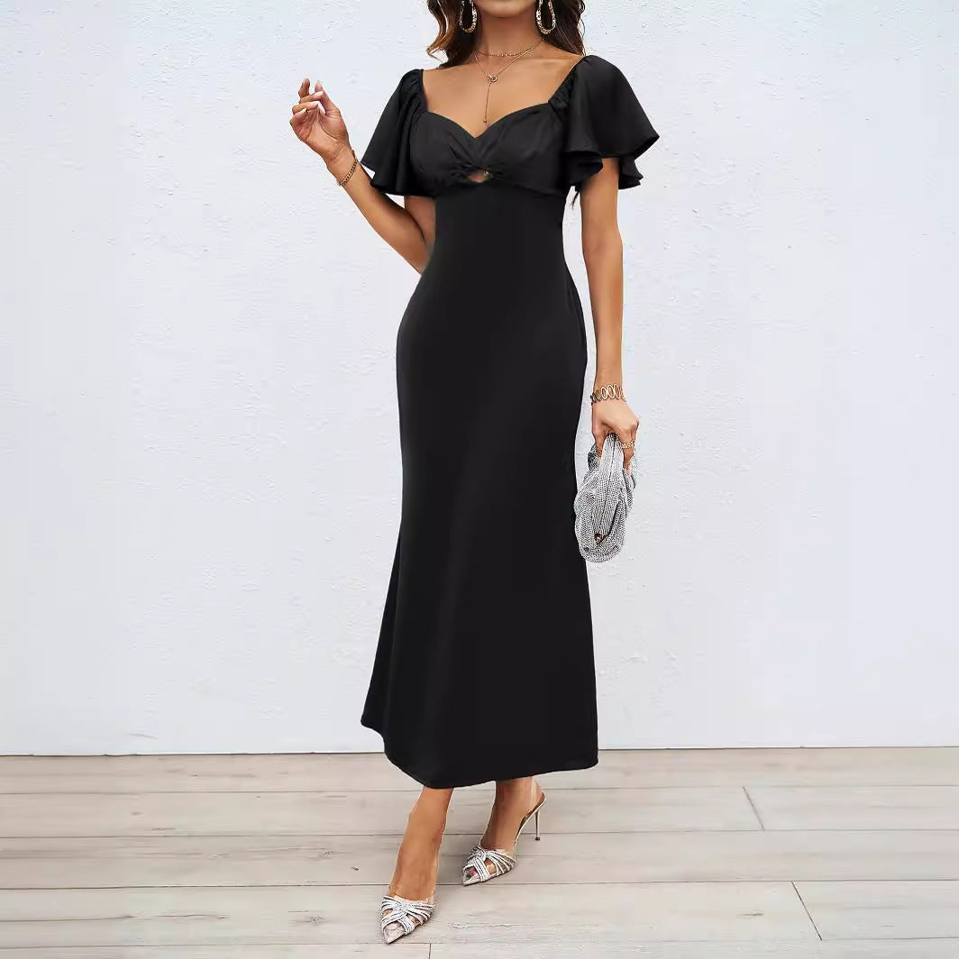Kvinnors maxi-kläder med avaxel-design, elegant knutdetalj och flödande tyg Mirla-Eva Jonsson
