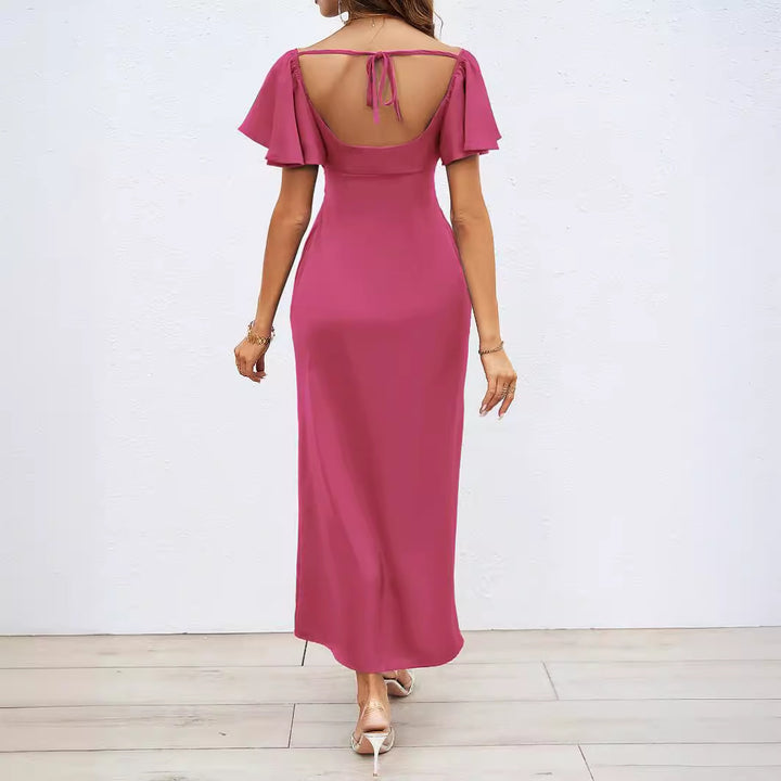Kvinnors maxi-kläder med avaxel-design, elegant knutdetalj och flödande tyg Mirla-Eva Jonsson