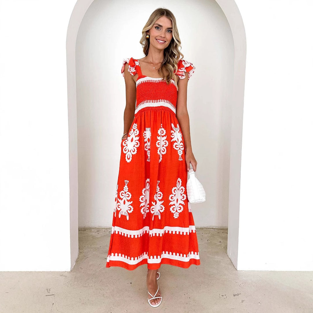 Kvinnors maxi klänning med blommig broderi och volangdetaljer Mirla-Eva Jonsson