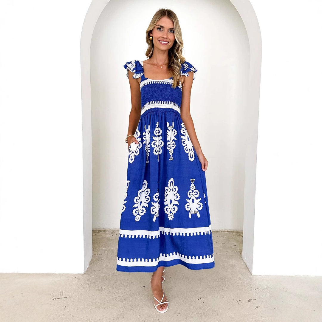 Kvinnors maxi klänning med blommig broderi och volangdetaljer Mirla-Eva Jonsson