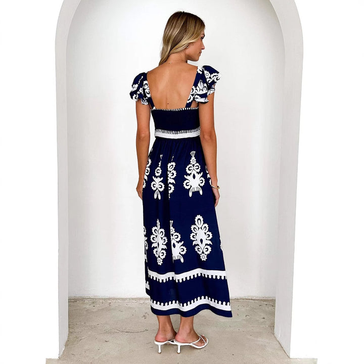 Kvinnors maxi klänning med blommig broderi och volangdetaljer Mirla-Eva Jonsson