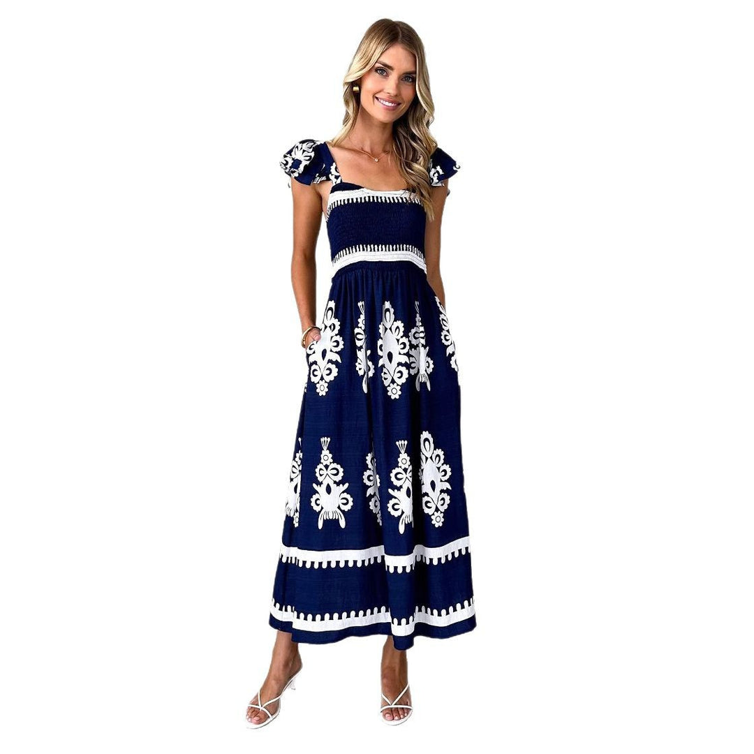 Kvinnors maxi klänning med blommig broderi och volangdetaljer Mirla-Eva Jonsson