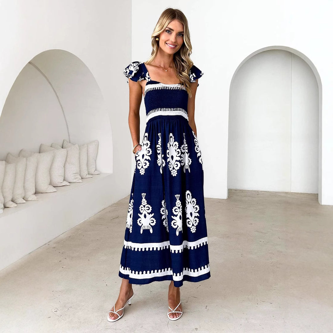 Kvinnors maxi klänning med blommig broderi och volangdetaljer Mirla-Eva Jonsson