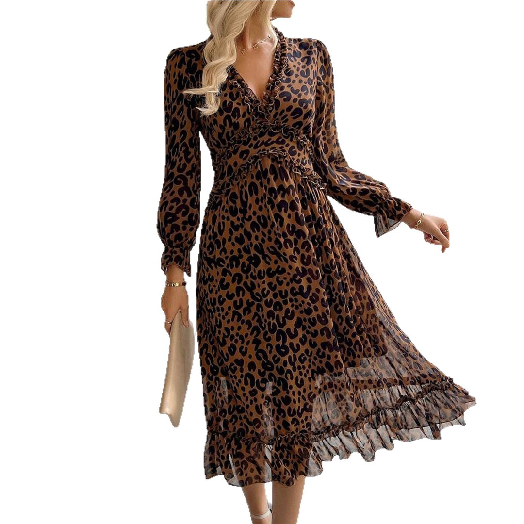 Kvinnors maxi klänning med elegant leopardtryck och voluminösa ärmar-Eva Jonsson
