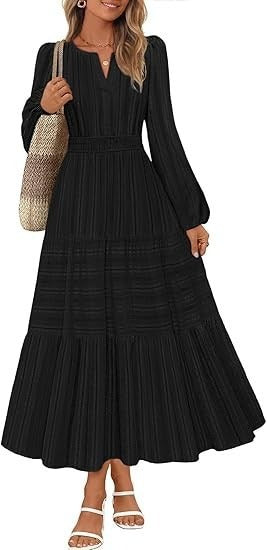 Kvinnors maxikjol med eleganta puffärmar och smockad midja Mirla-Eva Jonsson