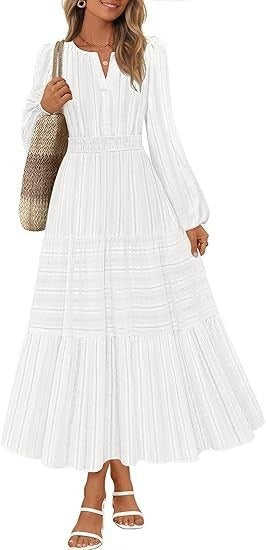 Kvinnors maxikjol med eleganta puffärmar och smockad midja Mirla-Eva Jonsson