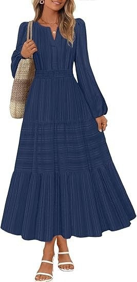 Kvinnors maxikjol med eleganta puffärmar och smockad midja Mirla-Eva Jonsson