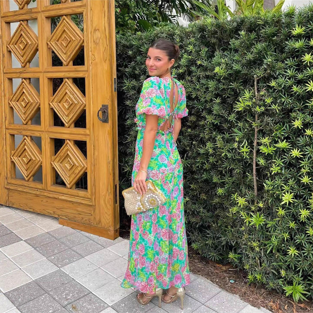 Kvinnors maxikjol med romantisk blommönster och flödande skärning Mirla-Eva Jonsson