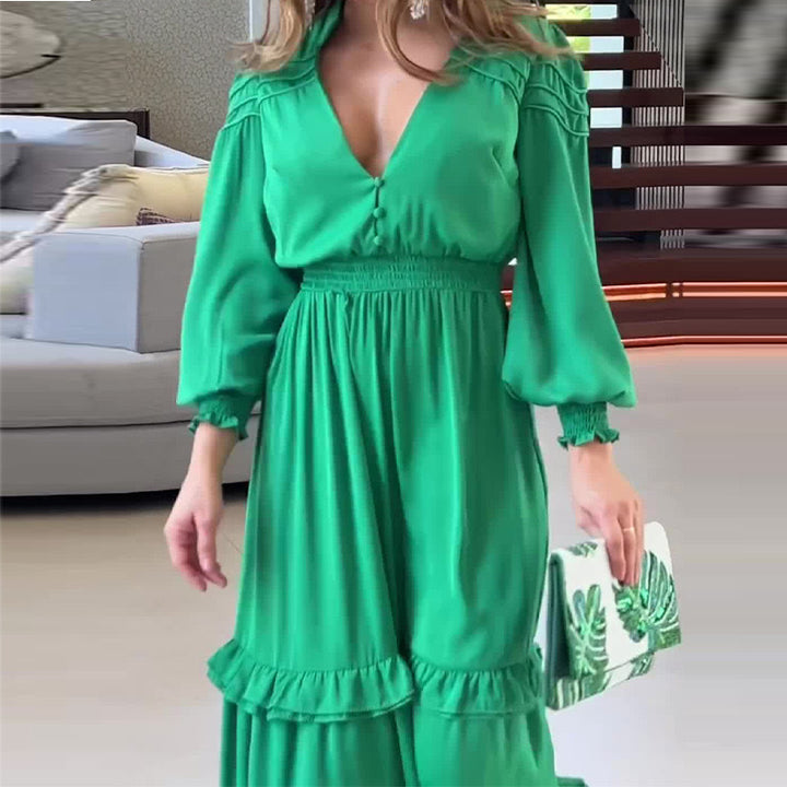 Kvinnors maxiklänning i boho-stil med voluminösa volanger och djup V-hals-Eva Jonsson