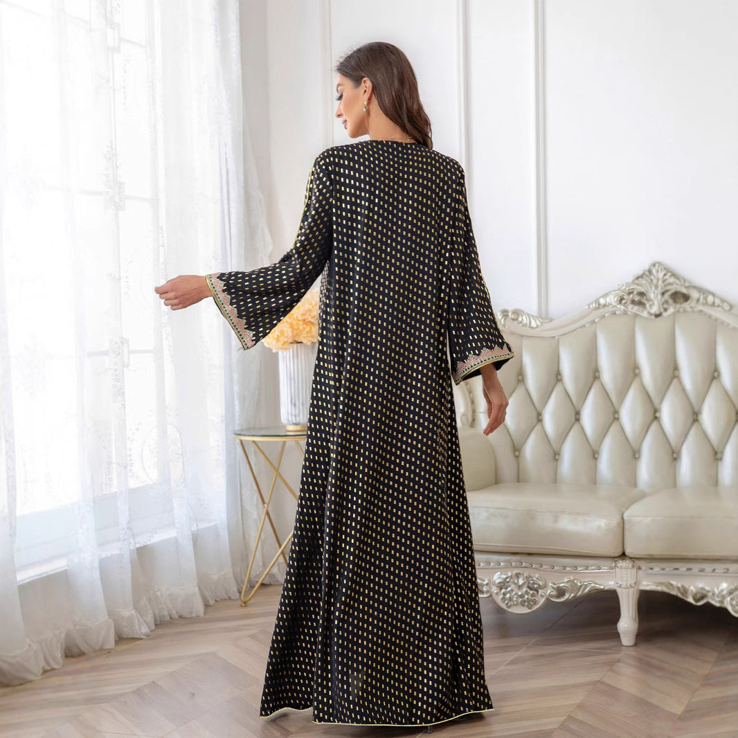 Kvinnors maxiklänning i elegant kaftanstil med delikata dekorationer Mirla-Eva Jonsson