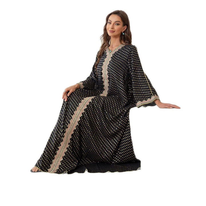 Kvinnors maxiklänning i elegant kaftanstil med delikata dekorationer Mirla-Eva Jonsson