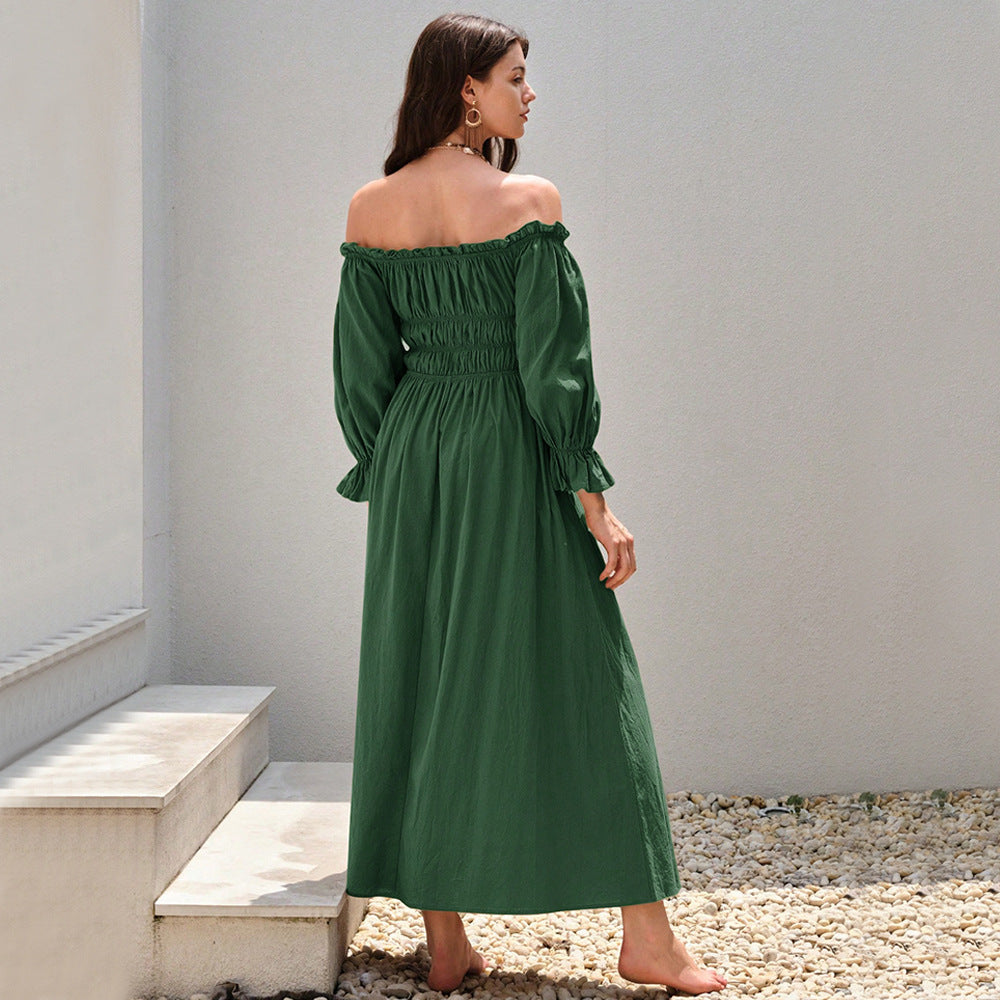 Kvinnors maxiklänning i elegant off-shoulder stil med samlade puffärmar Mirla-Eva Jonsson