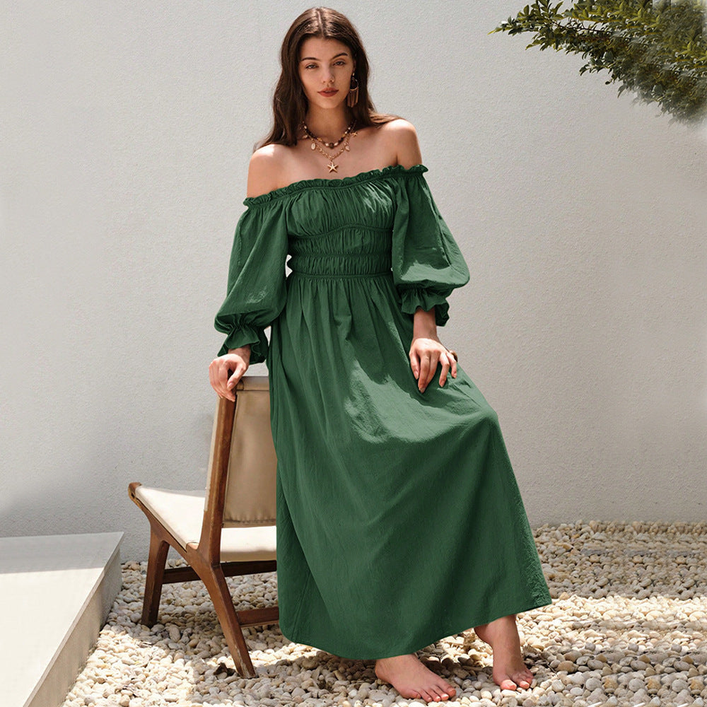 Kvinnors maxiklänning i elegant off-shoulder stil med samlade puffärmar Mirla-Eva Jonsson