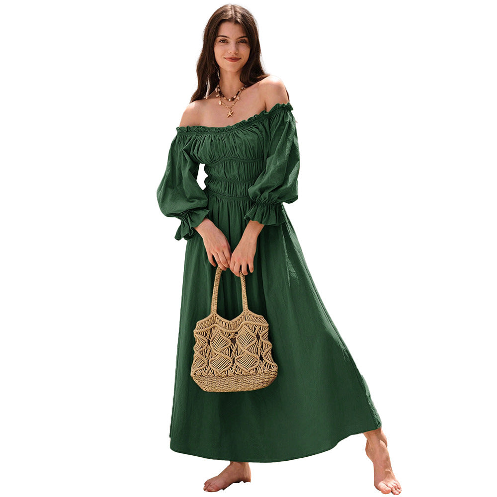 Kvinnors maxiklänning i elegant off-shoulder stil med samlade puffärmar Mirla-Eva Jonsson