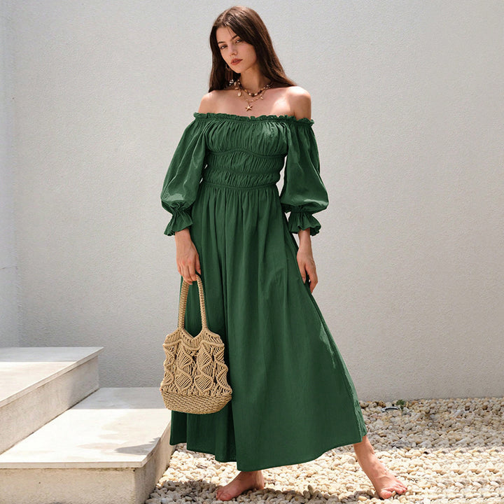 Kvinnors maxiklänning i elegant off-shoulder stil med samlade puffärmar Mirla-Eva Jonsson