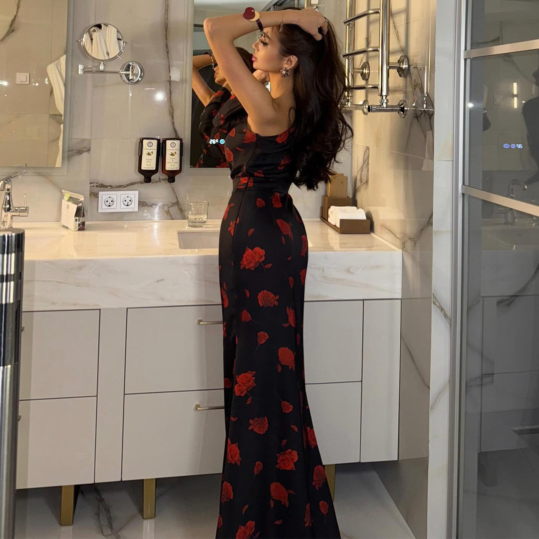 Kvinnors maxiklänning med asymmetrisk design och elegant blommönster-Eva Jonsson