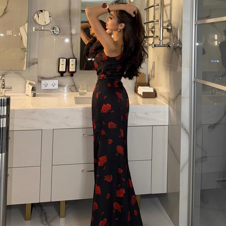 Kvinnors maxiklänning med asymmetrisk design och elegant blommönster-Eva Jonsson