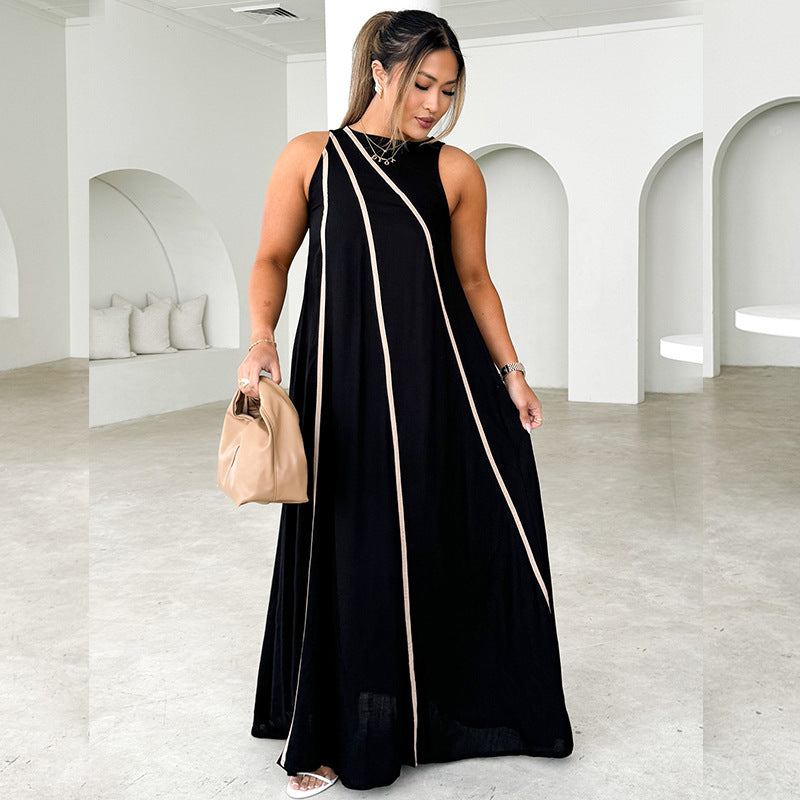 Kvinnors maxiklänning med asymmetrisk design och eleganta kontrastsömmar-Eva Jonsson