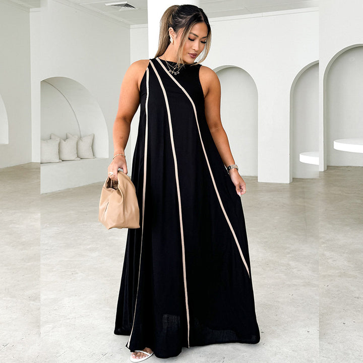 Kvinnors maxiklänning med asymmetrisk design och eleganta kontrastsömmar-Eva Jonsson