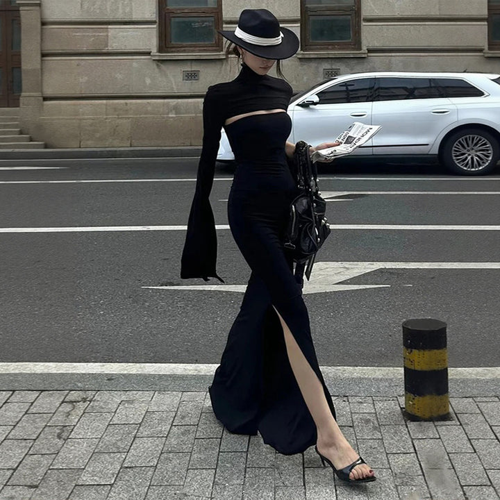 Kvinnors maxiklänning med asymmetrisk skärning och eleganta puffärmar Mirla-Eva Jonsson