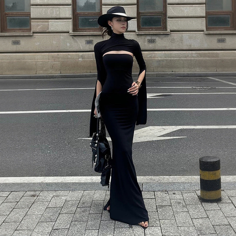 Kvinnors maxiklänning med asymmetrisk skärning och eleganta puffärmar Mirla-Eva Jonsson