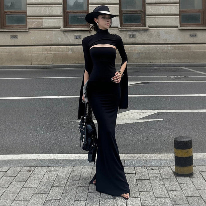 Kvinnors maxiklänning med asymmetrisk skärning och eleganta puffärmar Mirla-Eva Jonsson