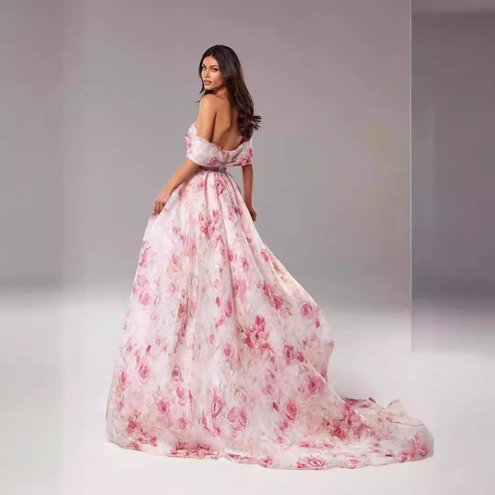 Kvinnors maxiklänning med axelbar design och blommönster Mirla-Eva Jonsson