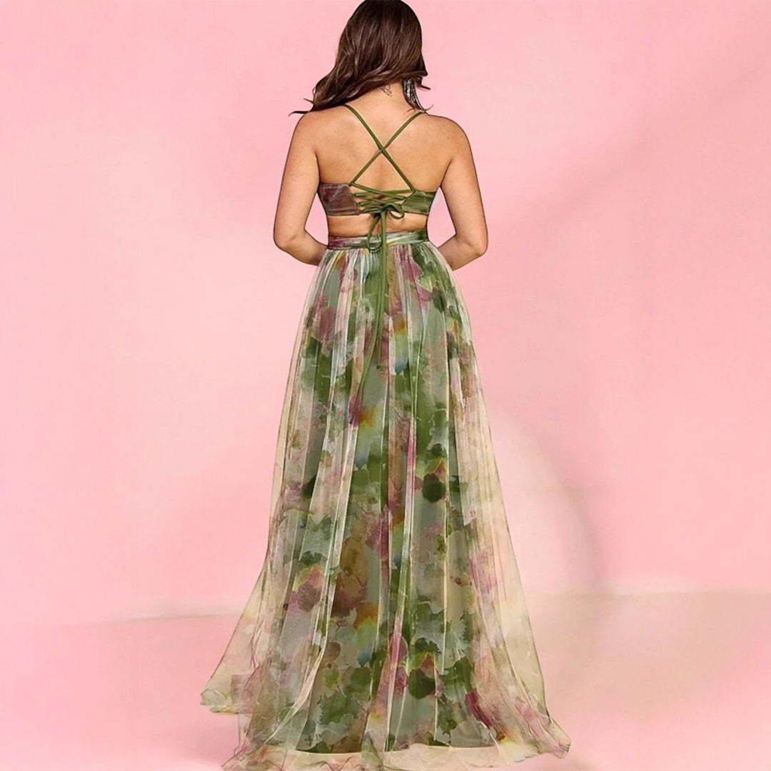 Kvinnors maxiklänning med blommig chiffondesign och elegant midja-Eva Jonsson