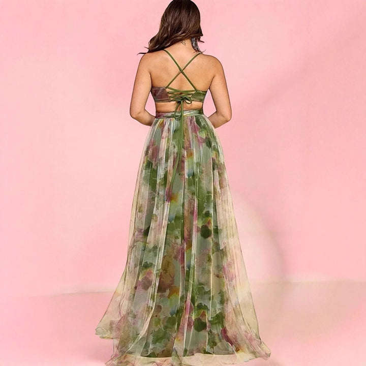 Kvinnors maxiklänning med blommig chiffondesign och elegant midja-Eva Jonsson