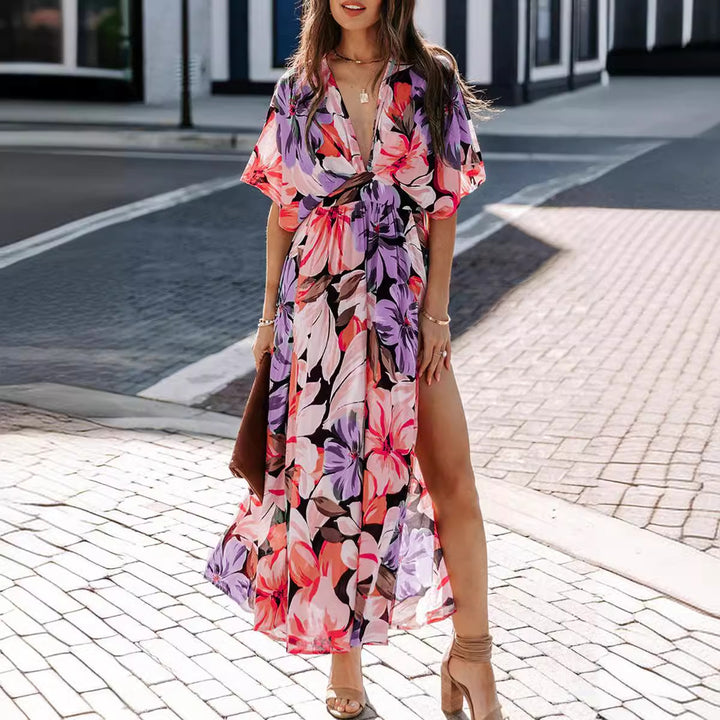 Kvinnors maxiklänning med blommig omslagdesign och djup V-ringning-Eva Jonsson
