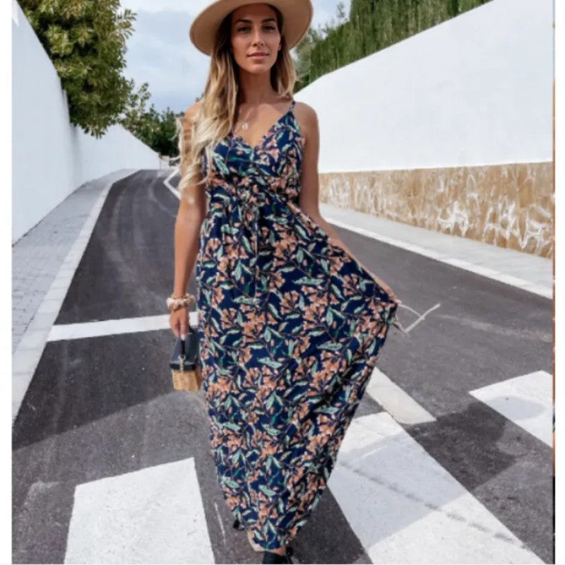 Kvinnors maxiklänning med blommig omslagsdesign och justerbart midjeband-Eva Jonsson