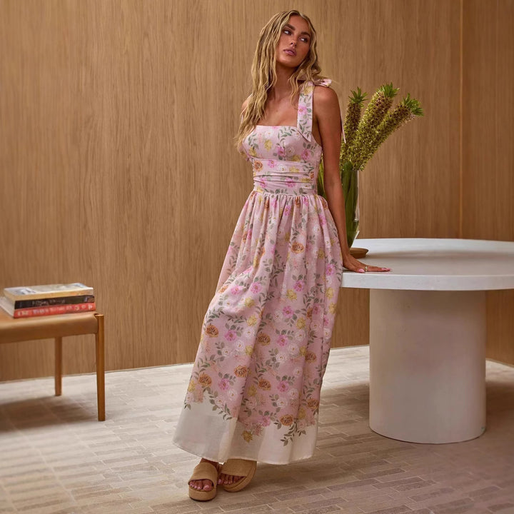 Kvinnors maxiklänning med blommiga accenter och justerbara spaghettistraps Mirla-Eva Jonsson