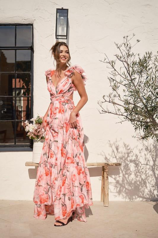 Kvinnors maxiklänning med blommiga volanger och svängande design-Eva Jonsson