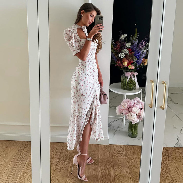 Kvinnors maxiklänning med blommönster och eleganta detaljer Mirla-Eva Jonsson