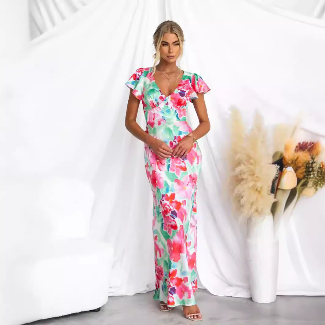 Kvinnors maxiklänning med blommönster och flödande silhuett Mirla-Eva Jonsson