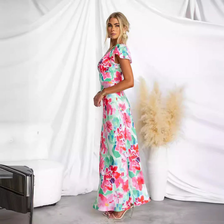 Kvinnors maxiklänning med blommönster och flödande silhuett Mirla-Eva Jonsson