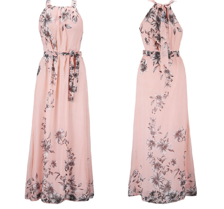 Kvinnors maxiklänning med blommönster och off-the-shoulder hals Mirla-Eva Jonsson