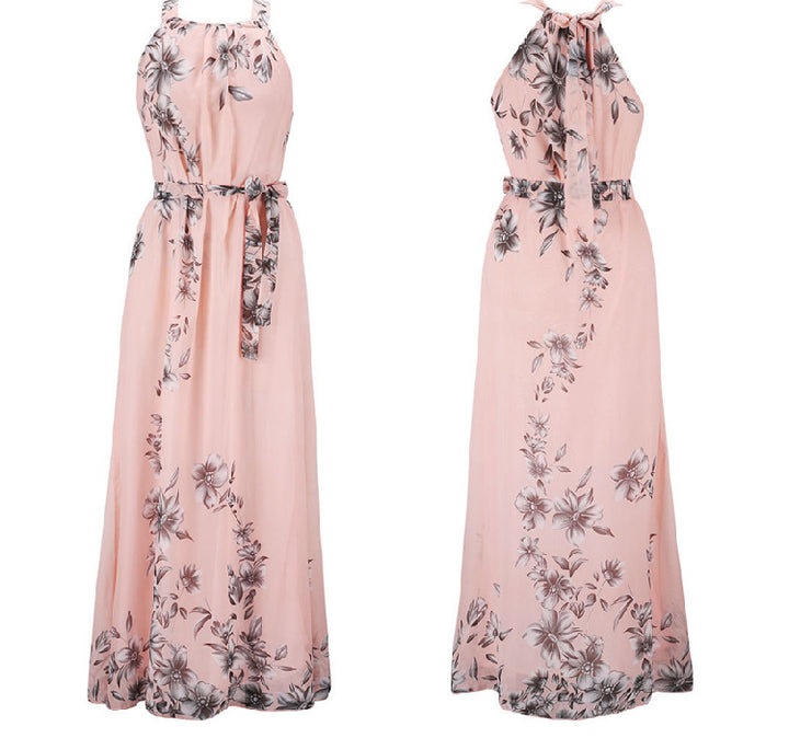 Kvinnors maxiklänning med blommönster och off-the-shoulder hals Mirla-Eva Jonsson