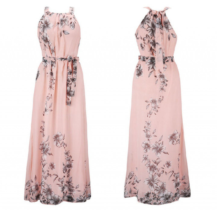 Kvinnors maxiklänning med blommönster och off-the-shoulder hals Mirla-Eva Jonsson