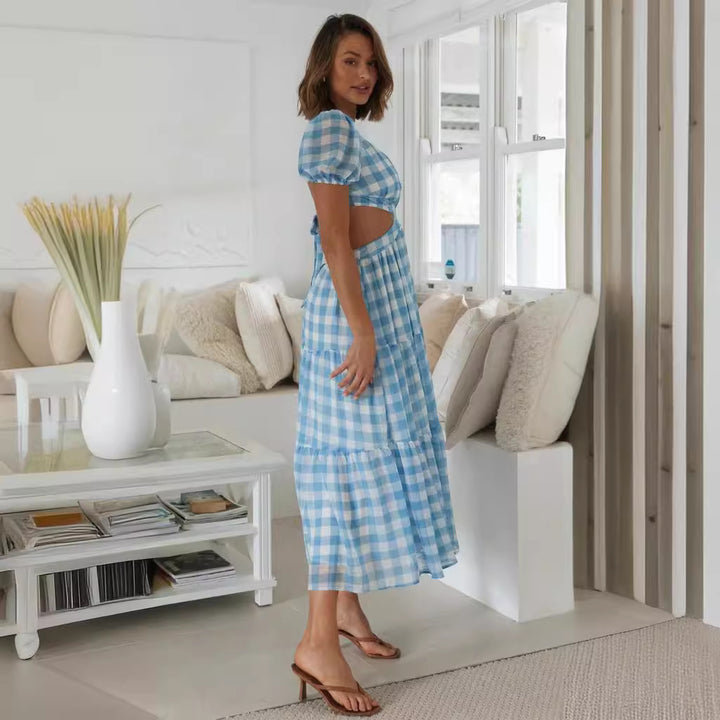 Kvinnors maxiklänning med cut-outs och voluminösa puffärmar Mirla-Eva Jonsson