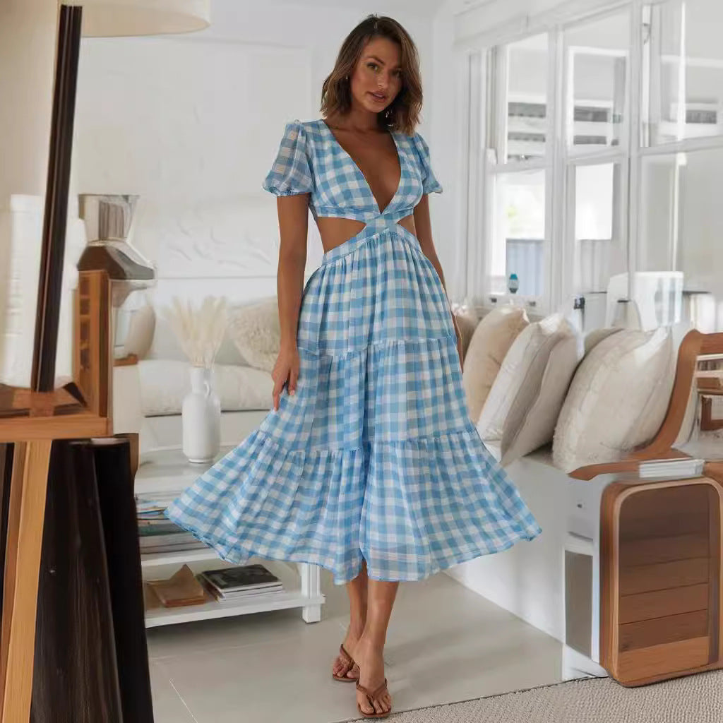Kvinnors maxiklänning med cut-outs och voluminösa puffärmar Mirla-Eva Jonsson