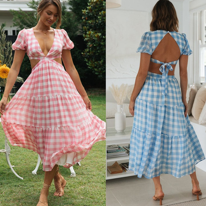 Kvinnors maxiklänning med cut-outs och voluminösa puffärmar Mirla-Eva Jonsson
