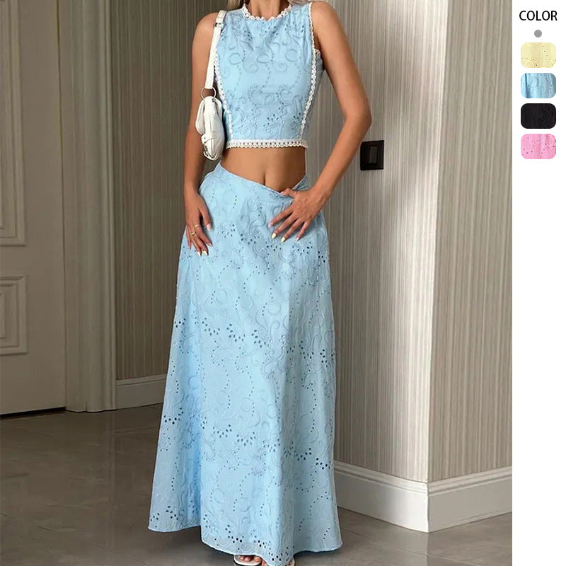 Kvinnors maxiklänning med delikat hål broderimönster och trendig crop top Mirla-Eva Jonsson