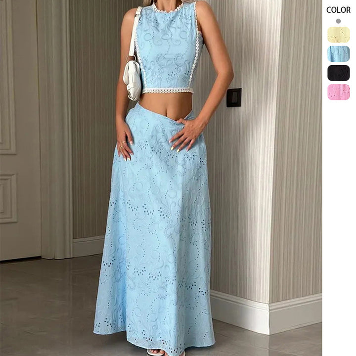 Kvinnors maxiklänning med delikat hål broderimönster och trendig crop top Mirla-Eva Jonsson