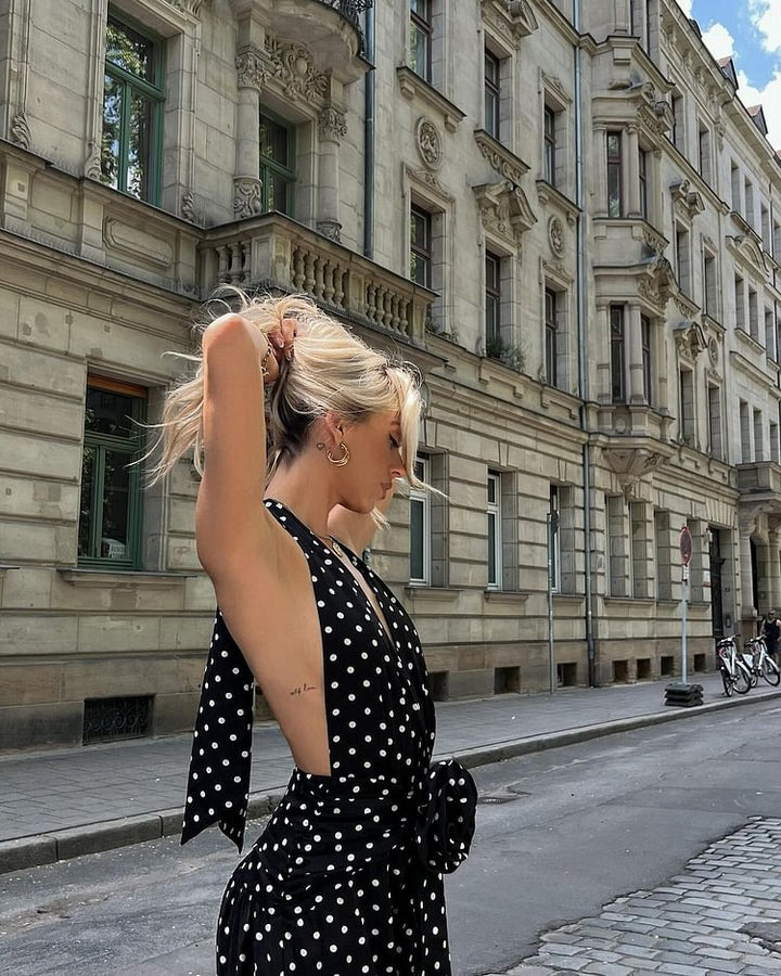 Kvinnors maxiklänning med djup V-hals och utsvängd kjol Mirla-Eva Jonsson